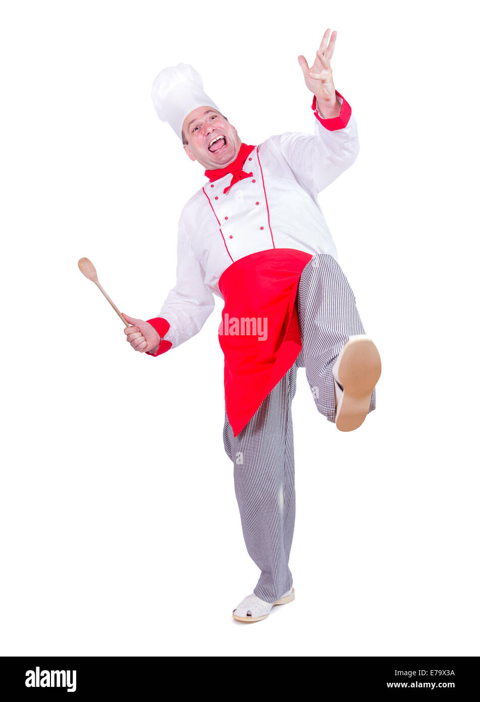 Lo chef allegro danza su sfondo bianco Foto Stock