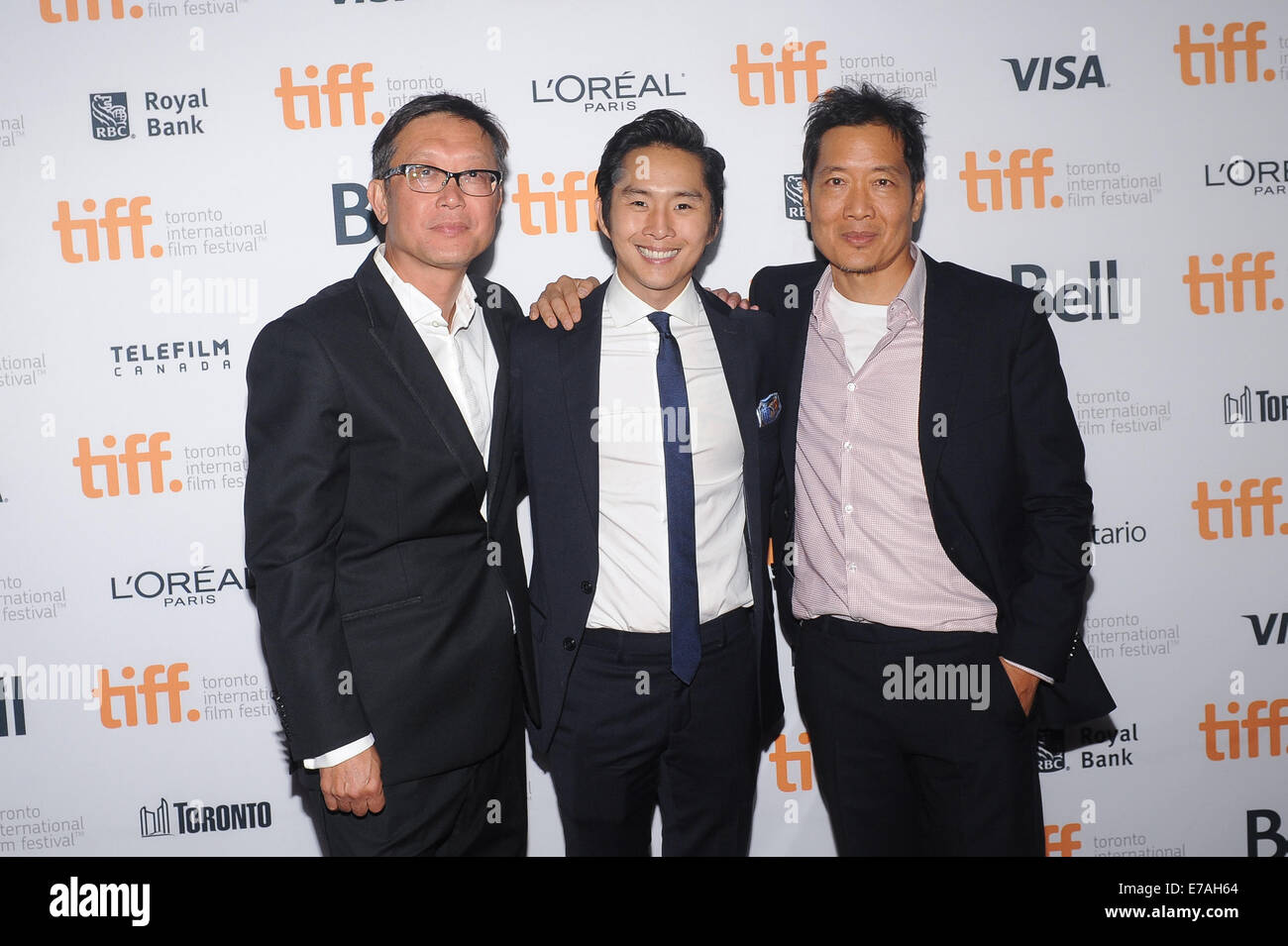 Toronto, Canada. 10 Settembre, 2014. Direttore Andrew Lau, attore Justin Chon e Direttore Andrew Loo frequentare il "La vendetta dei draghi verde' premiere durante il 2014 Toronto International Film Festival al teatro Ryerson su Settembre 10, 2014 a Toronto in Canada. Credito: Igor Vidyashev/ZUMA filo/Alamy Live News Foto Stock