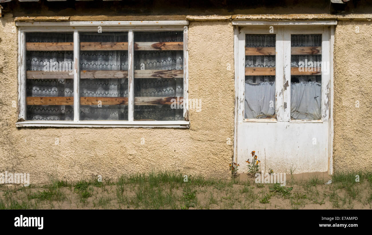 Svuotare intavolato House, Camber Sands, campanatura, East Sussex, Gran Bretagna. Foto Stock