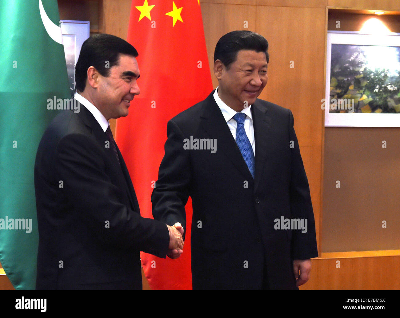 Dushanbe, Tagikistan. Xii Sep, 2014. Il presidente cinese Xi Jinping (R) si incontra con il Presidente turkmeno Gurbanguly Berdymukhamedov a Dushanbe, capitale del Tagikistan, Sett. 12, 2014. Credito: Ma Zhancheng/Xinhua/Alamy Live News Foto Stock