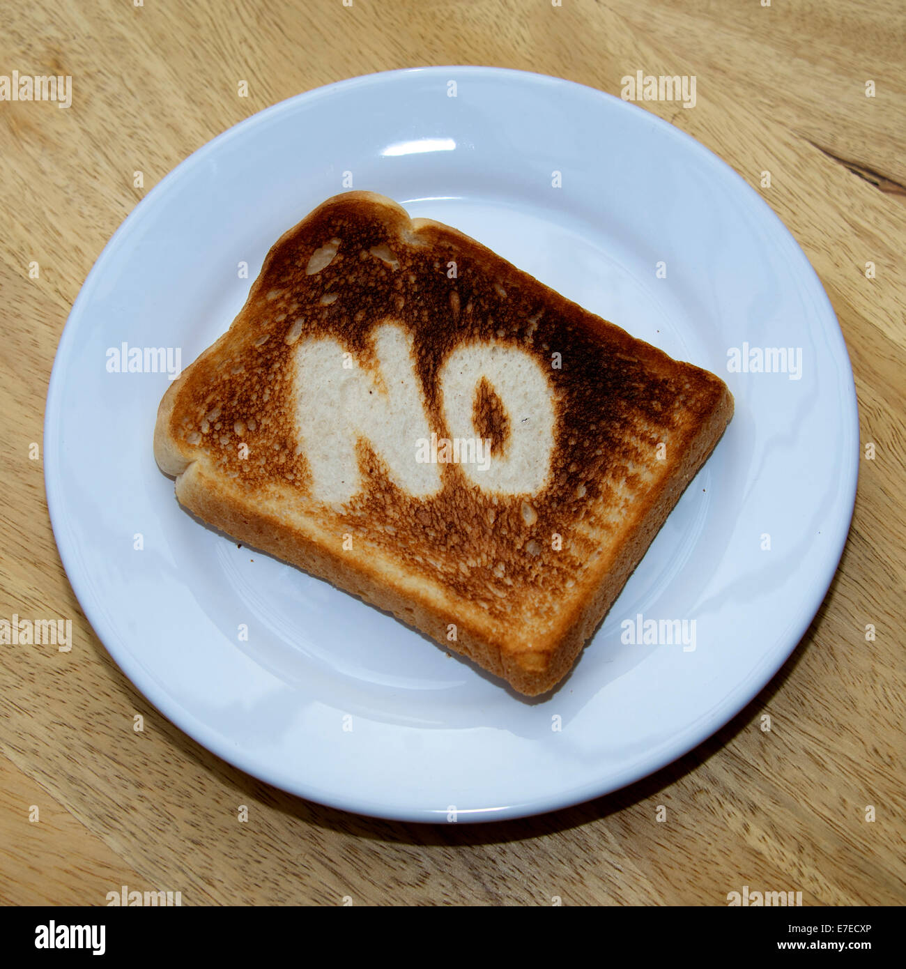 Nessun masterizzato su un pezzo di pane tostato Foto Stock