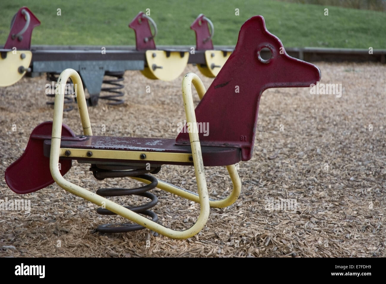 Molla rimbalzante giocattolo in un Playgorund Foto Stock