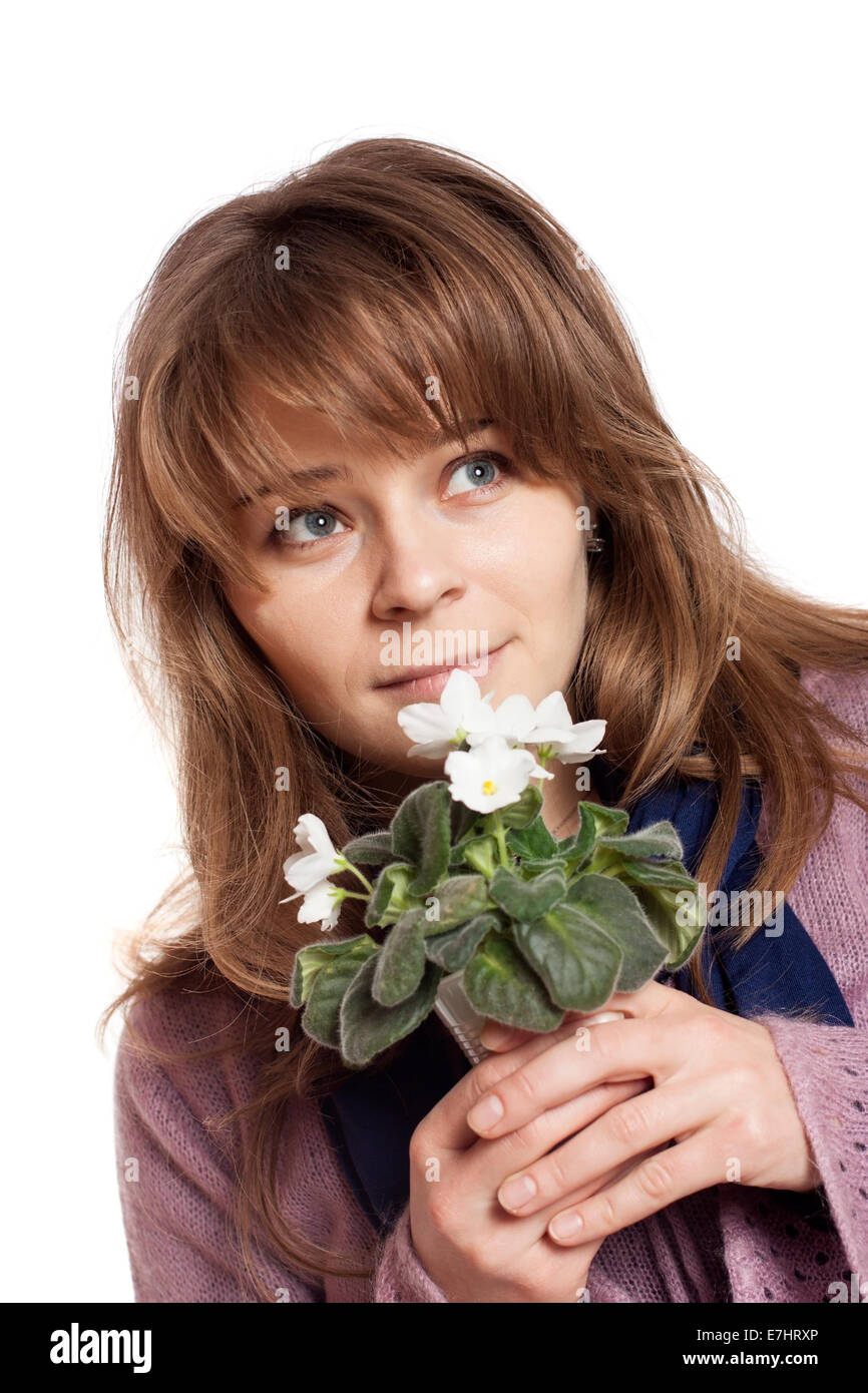 Donna bionda azienda bianco fiori isolati su sfondo bianco Foto Stock