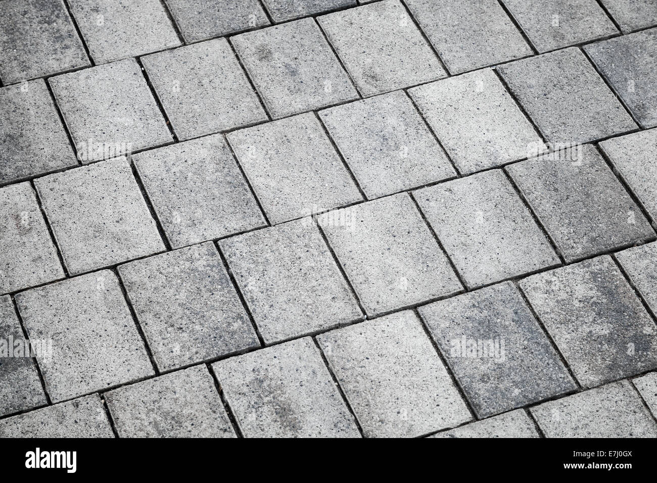 Grigio piastrelle di calcestruzzo, pavimentazione urbana, texture di sfondo Foto Stock