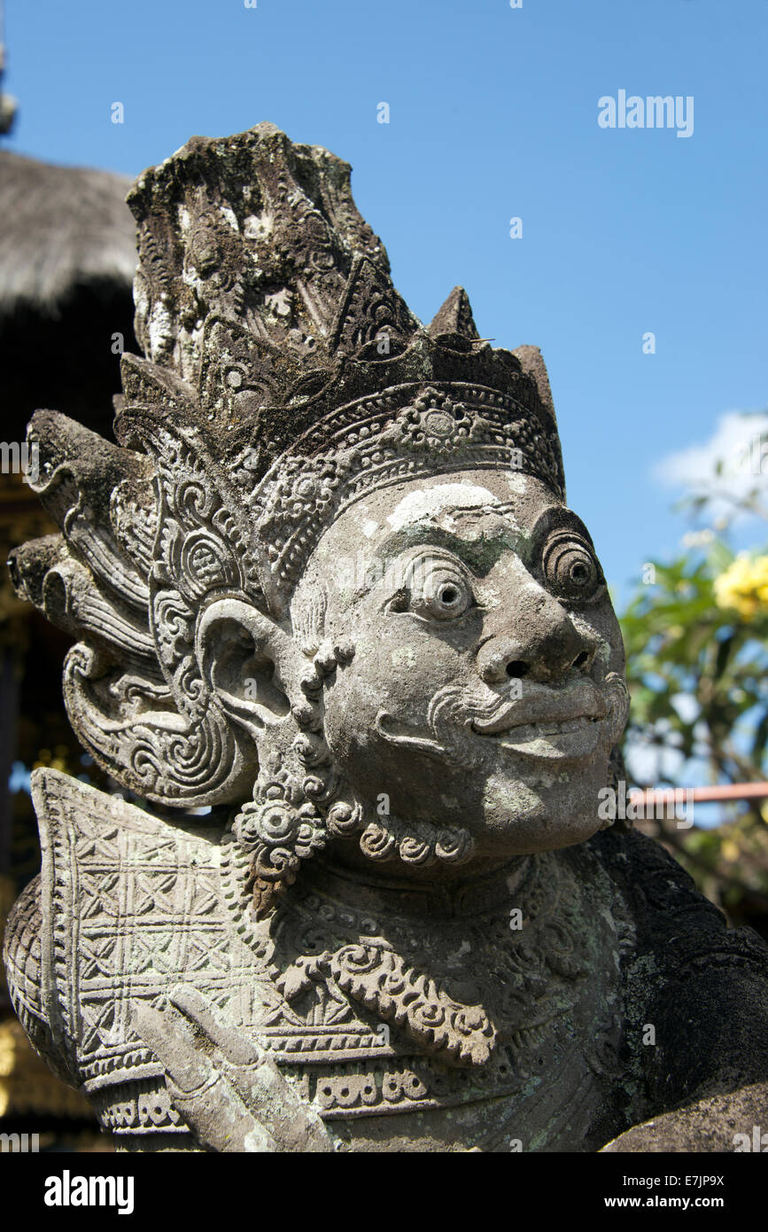 Demon stone carving tempio Kerambitan Bali Indonesia Foto Stock