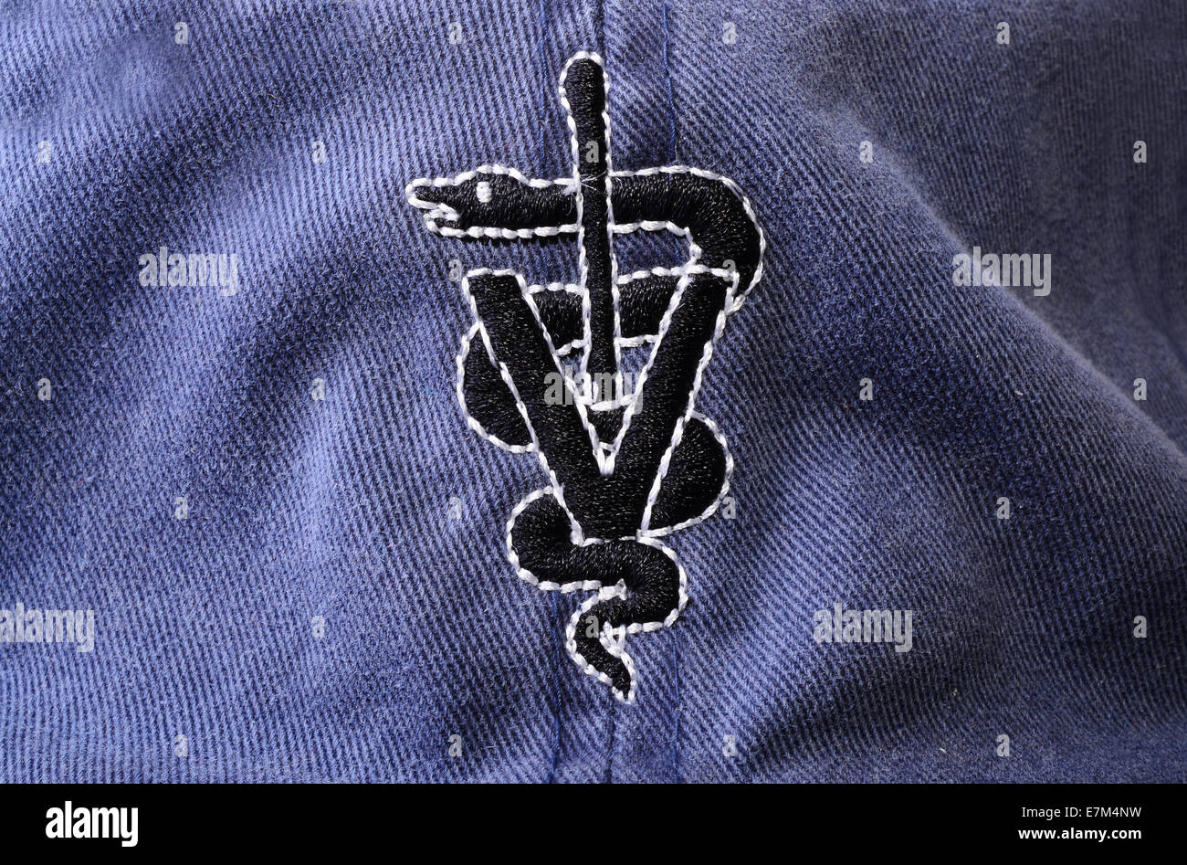 Ripresa macro di un cappello che mostra la medicina veterinaria segno Foto Stock