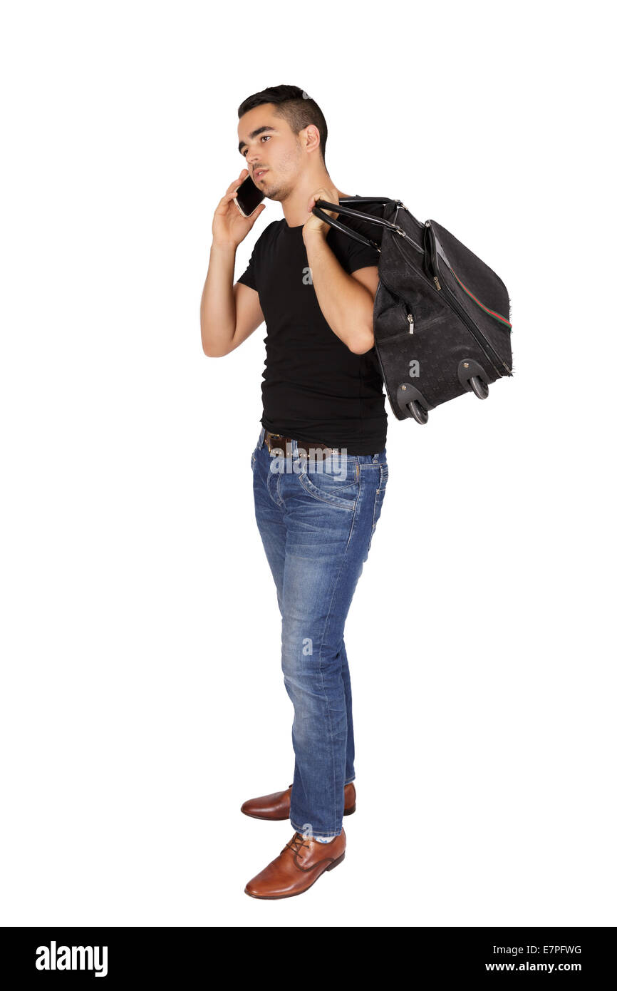 Giovane ragazzo sacco di contenimento a parlare sul suo cellulare su sfondo bianco Foto Stock