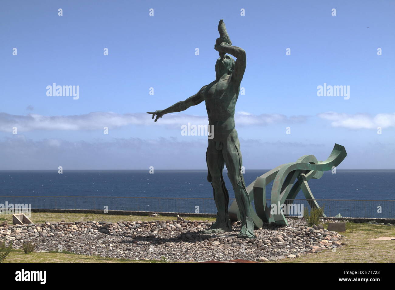 Una scultura in bronzo di Triton, dio greco del mare. Foto Stock