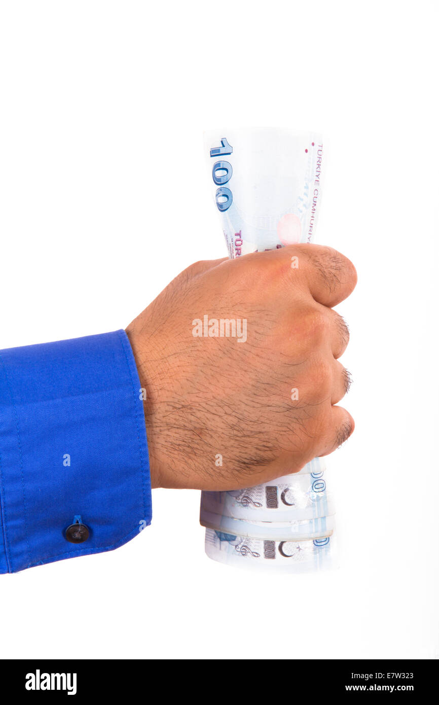 Spremitura a mano cento lire turche banconote, isolati su sfondo bianco. Foto Stock