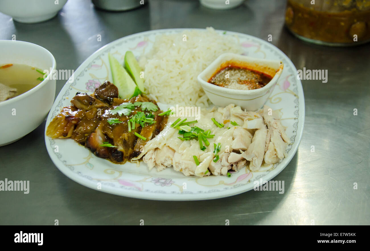 Delizioso cibo tailandese chiamata KHAO MUN KAI dal pollo e succo piccante Foto Stock