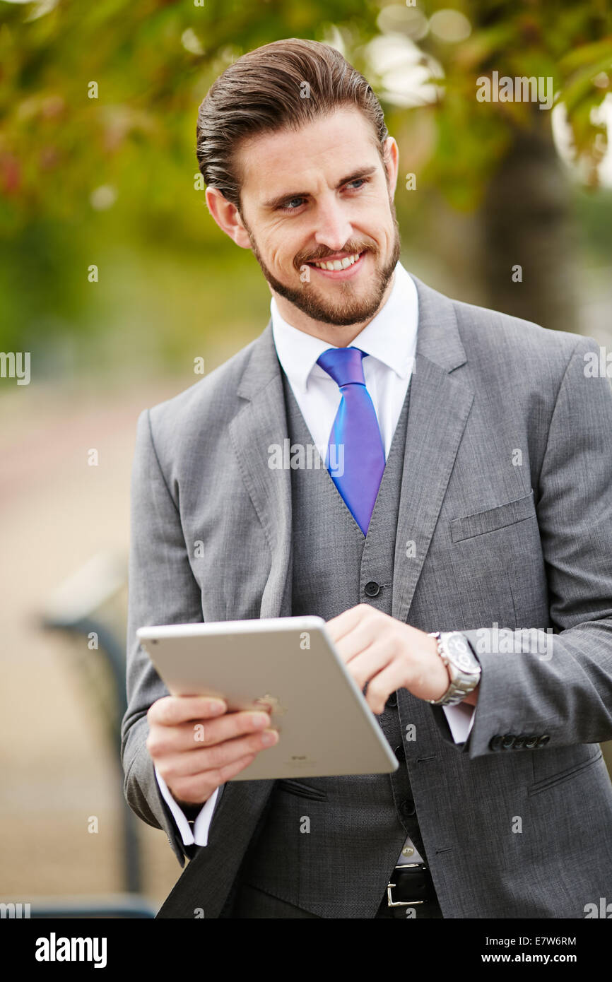 Imprenditore sorridente Foto Stock