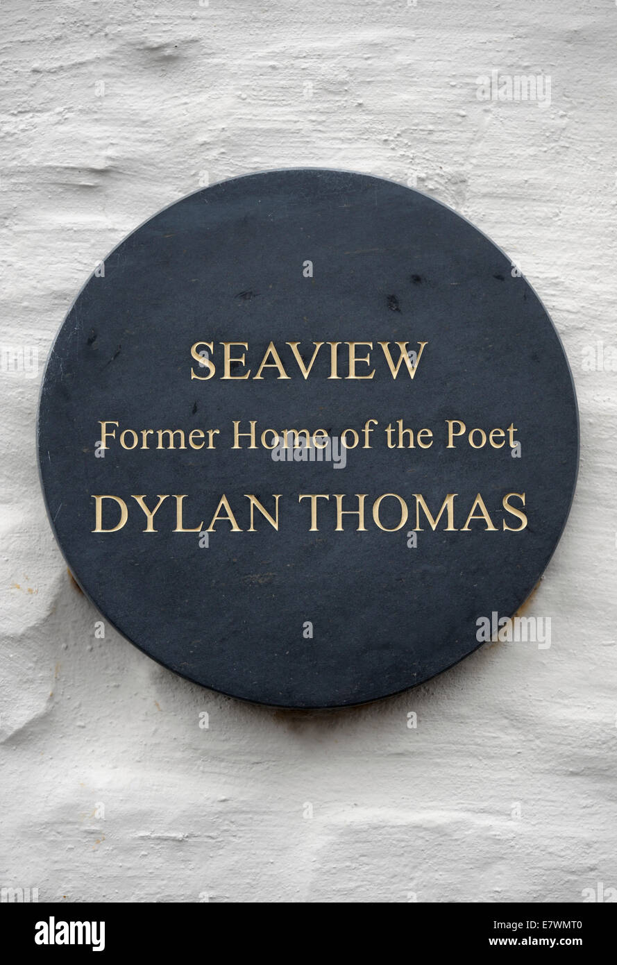 La placca per celebrare il poeta Dylan Thomas a Laugharne in Carmarthenshire, Wales UK Foto Stock