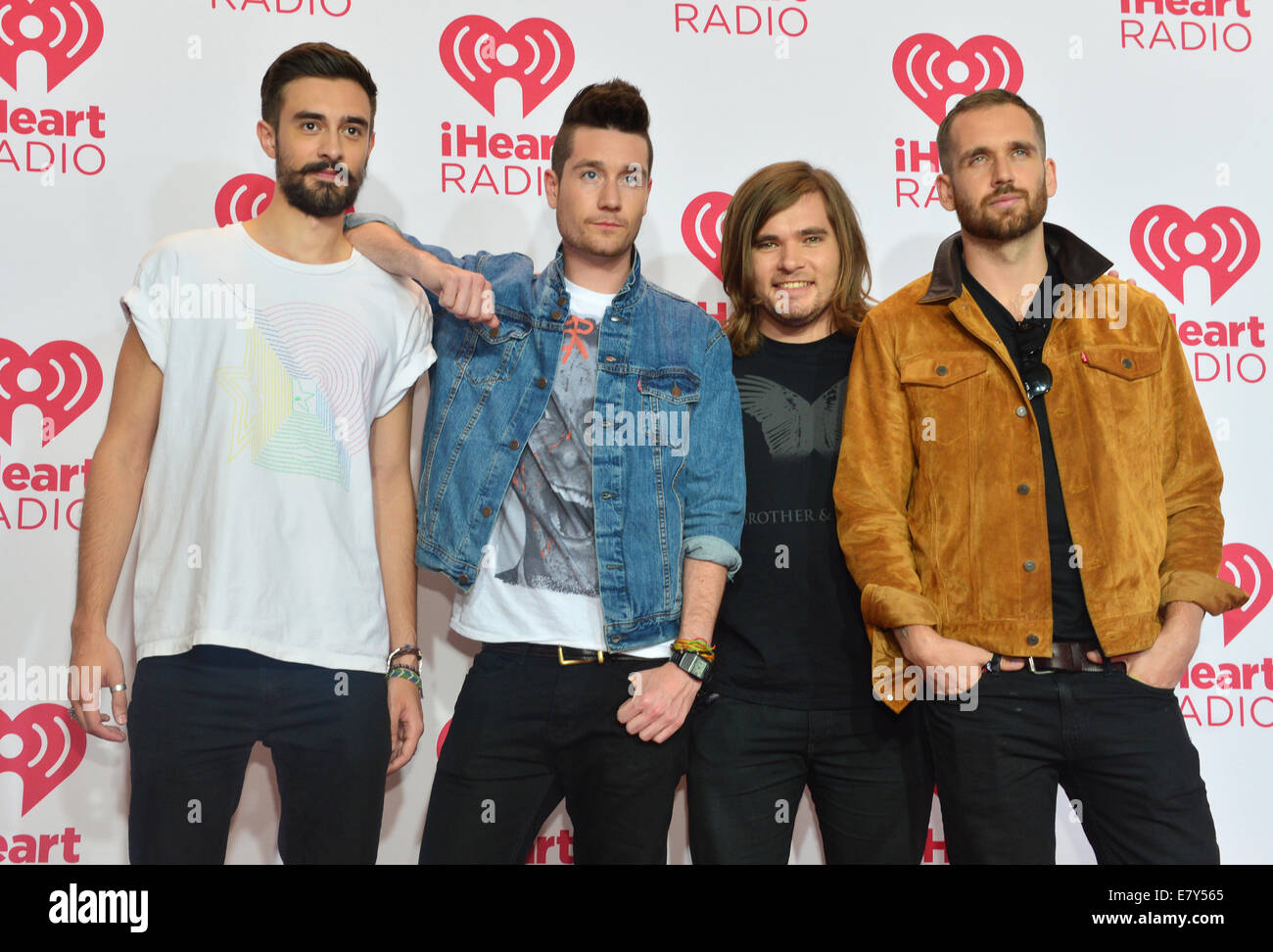 Membri della rock band Bastille assiste il 2014 iHeartRadio Music Festival Foto Stock