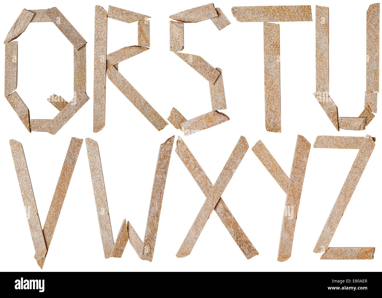 Insieme di lettere di pietre di ardesia isolati su sfondo bianco. Il file contiene un percorso di clipping. Foto Stock