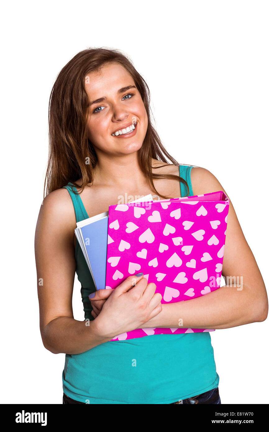 Sorridente giovane donna con libri Foto Stock