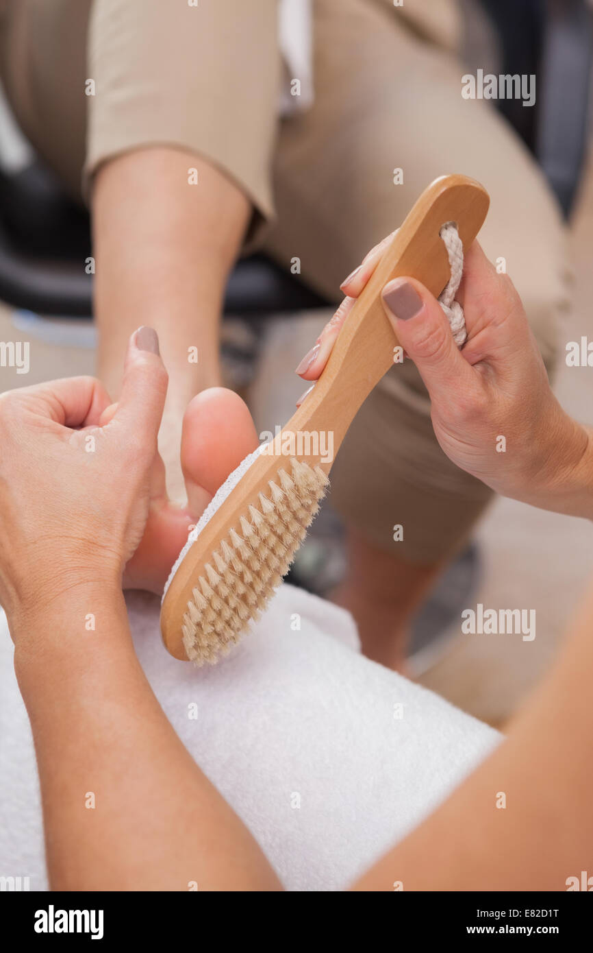 Cliente ottenendo in corrispondenza di pedicure manicure Foto Stock