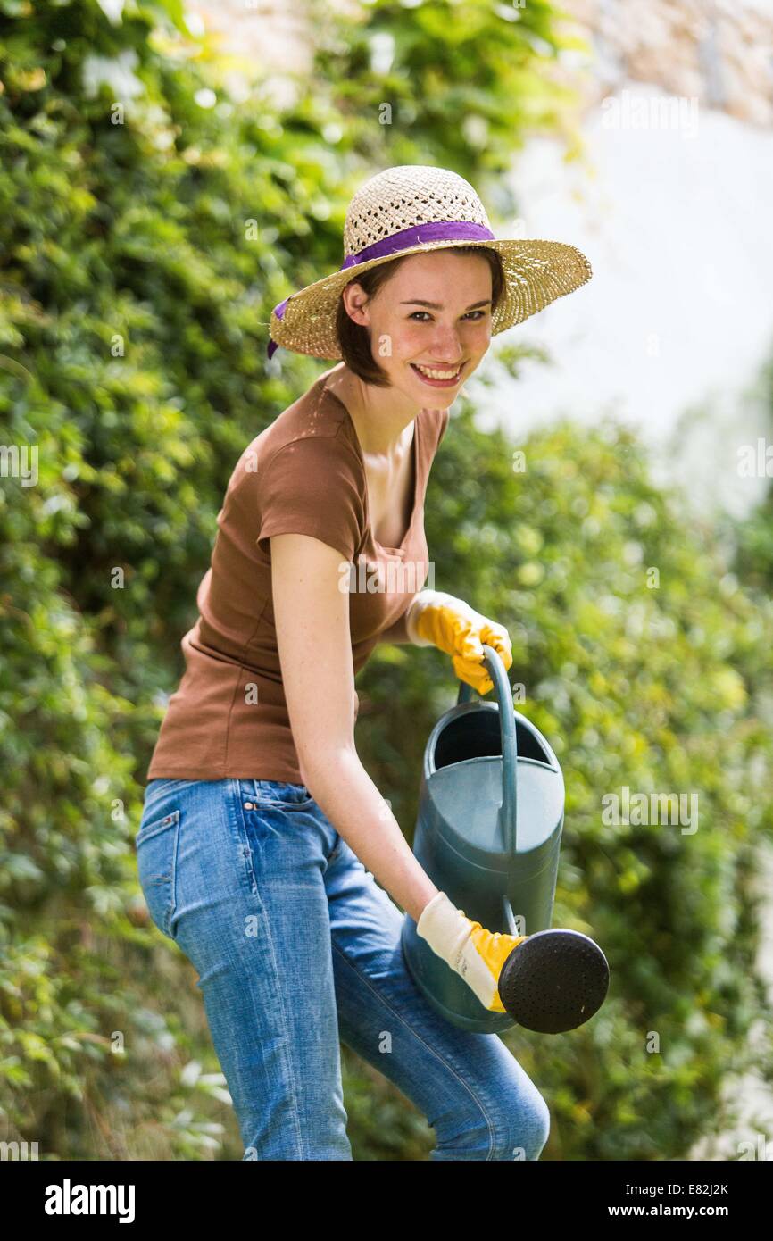 Donna di giardinaggio. Foto Stock