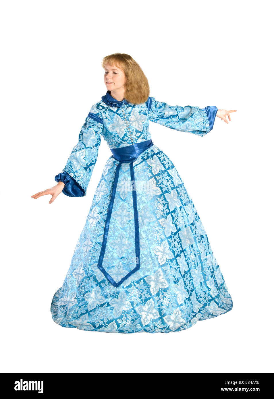 Donna bionda in un vestito blu con crinolina Foto Stock