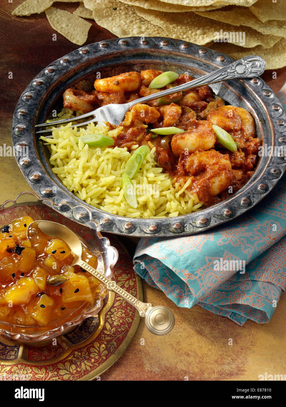 Il curry di gamberi con chutney di mango Foto Stock