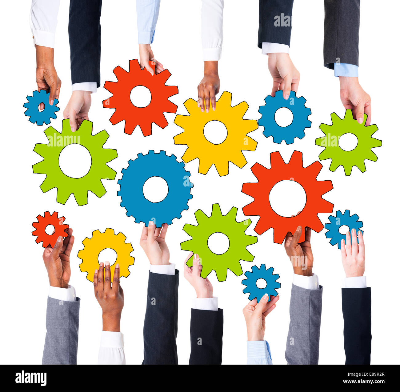 La gente di affari tenendo i simboli di marcia Foto Stock