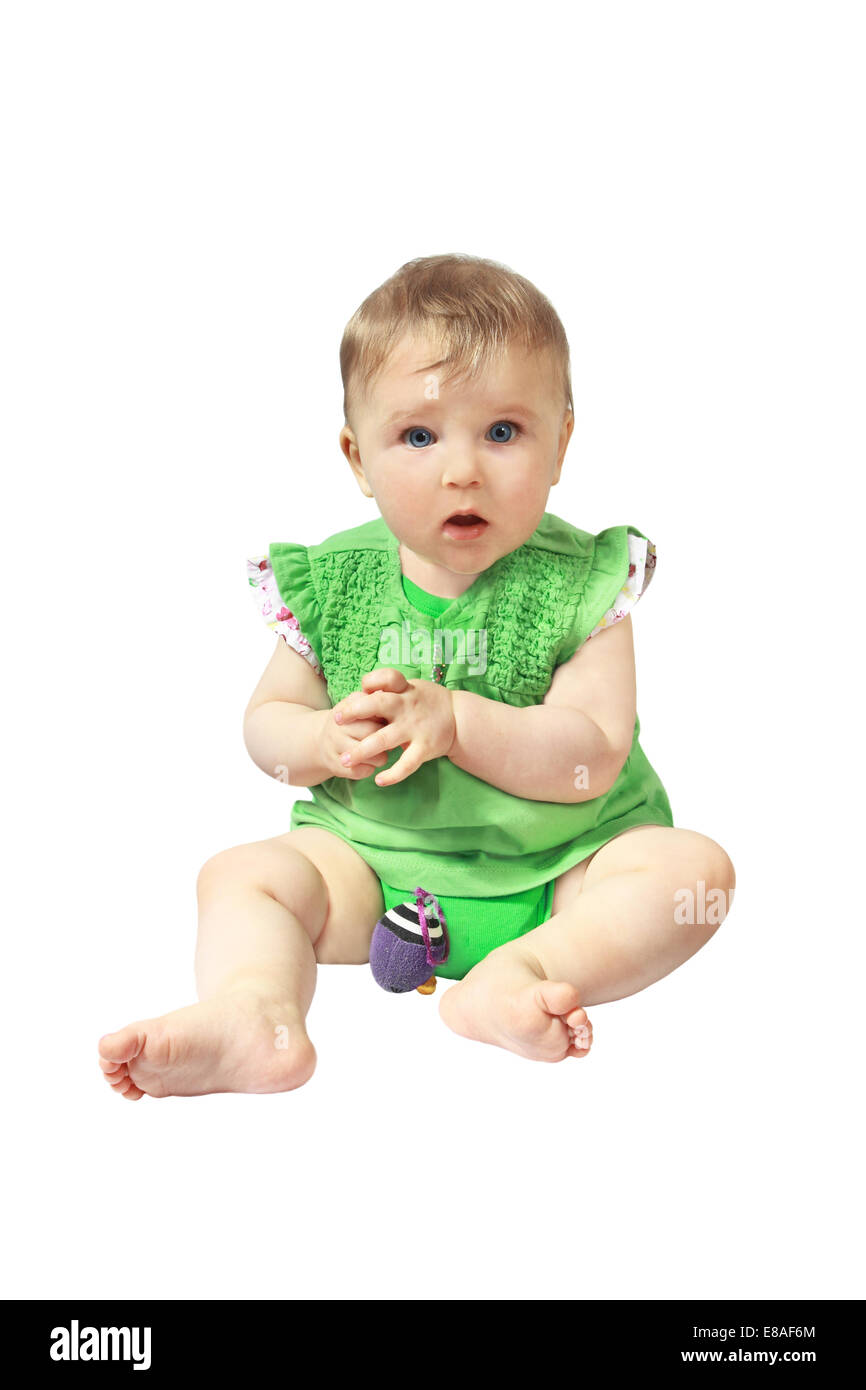 Openeyed neonato si siede con toy isolati su sfondo bianco Foto Stock