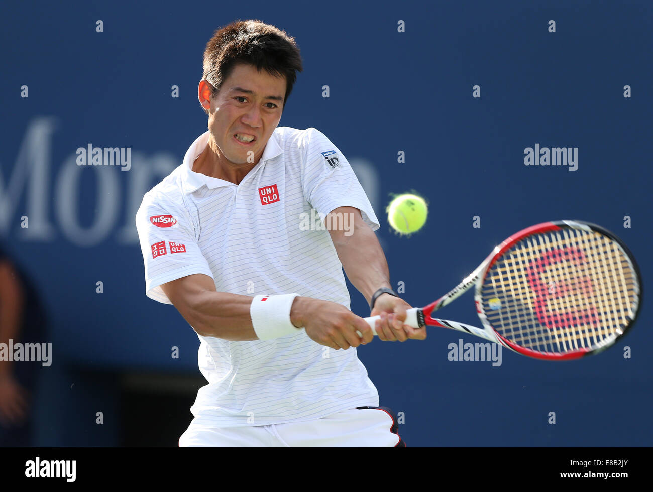 Kei Nishikori (JPN) in azione a US Open 2014 in New York, Stati Uniti d'America. Foto Stock