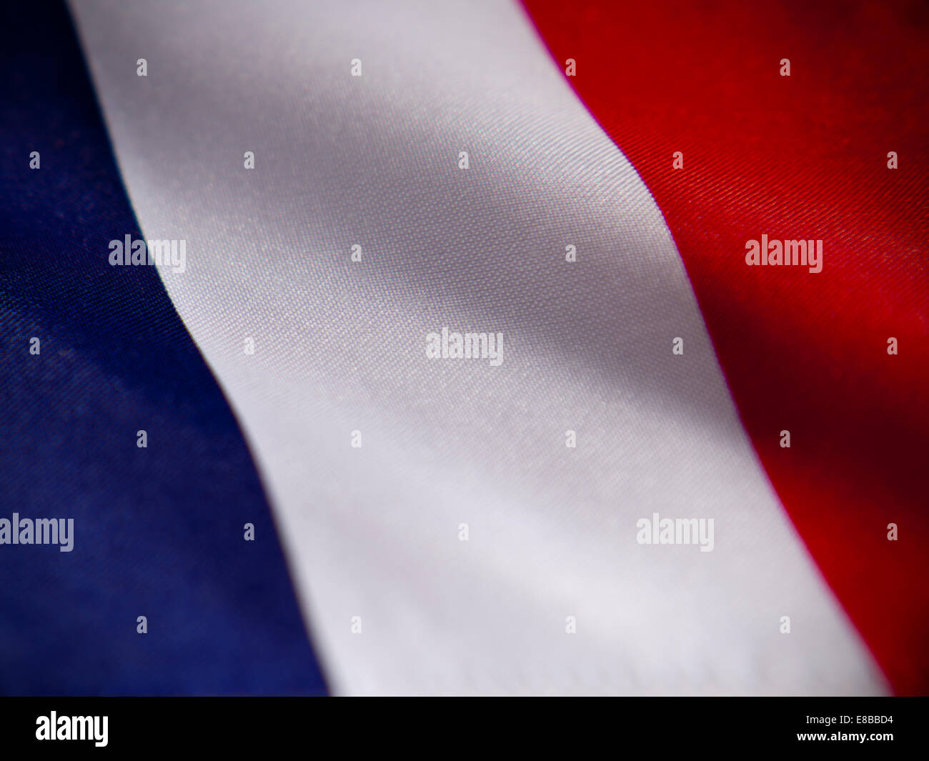 Abstract vista macro della bandiera francese con profondità di campo ridotta. Foto Stock