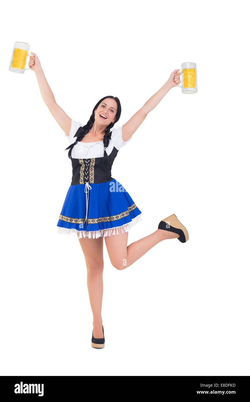 Oktoberfest Pretty girl holding boccali di birra Foto Stock