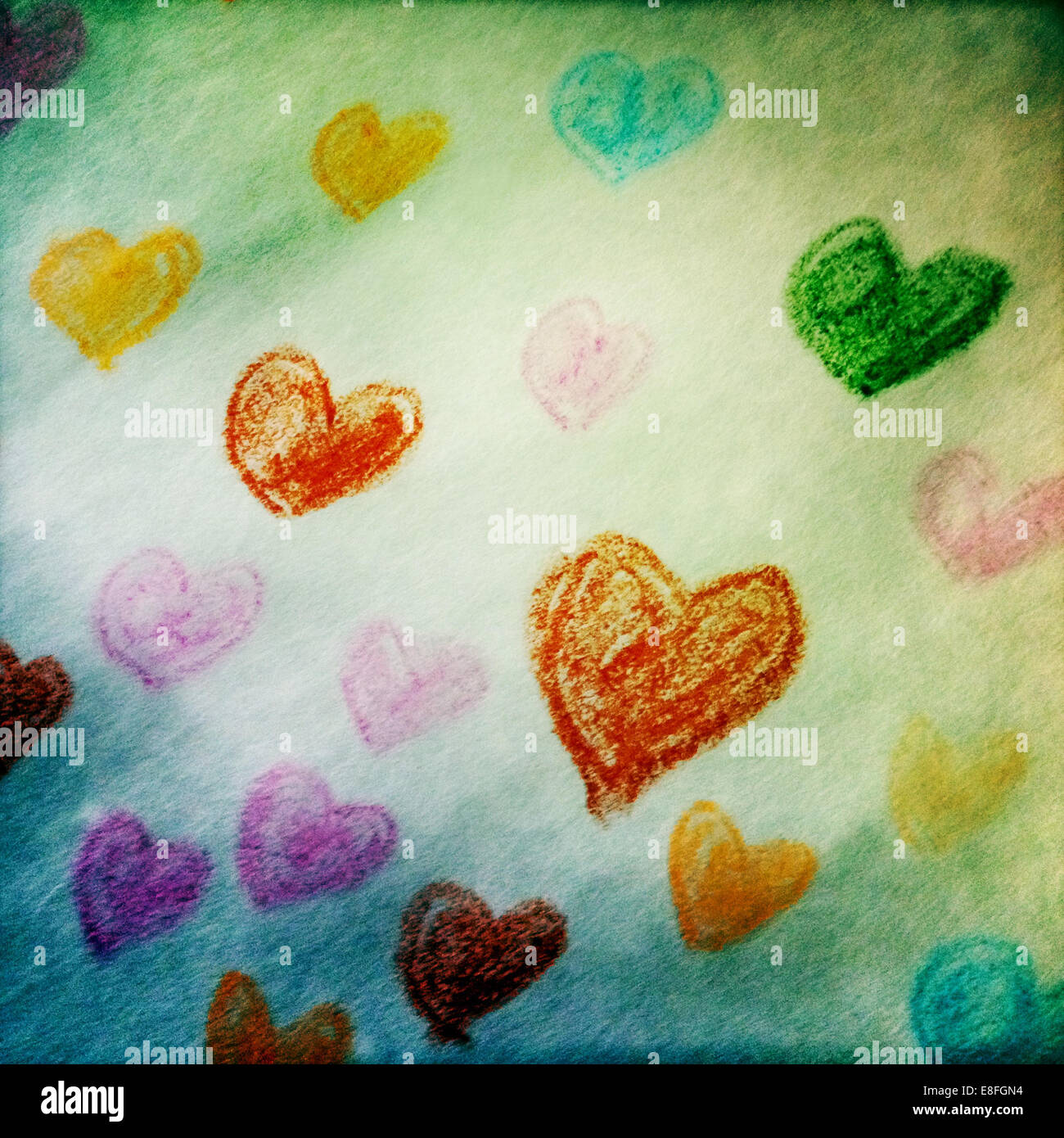 Multi-Colored Cuori attirato su carta Foto Stock