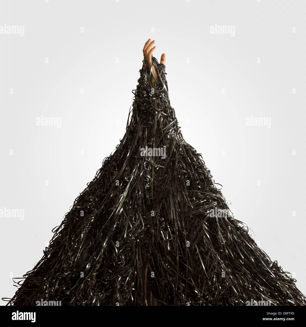 Man mano che emergono dalla pila del nastro di registrazione Foto Stock