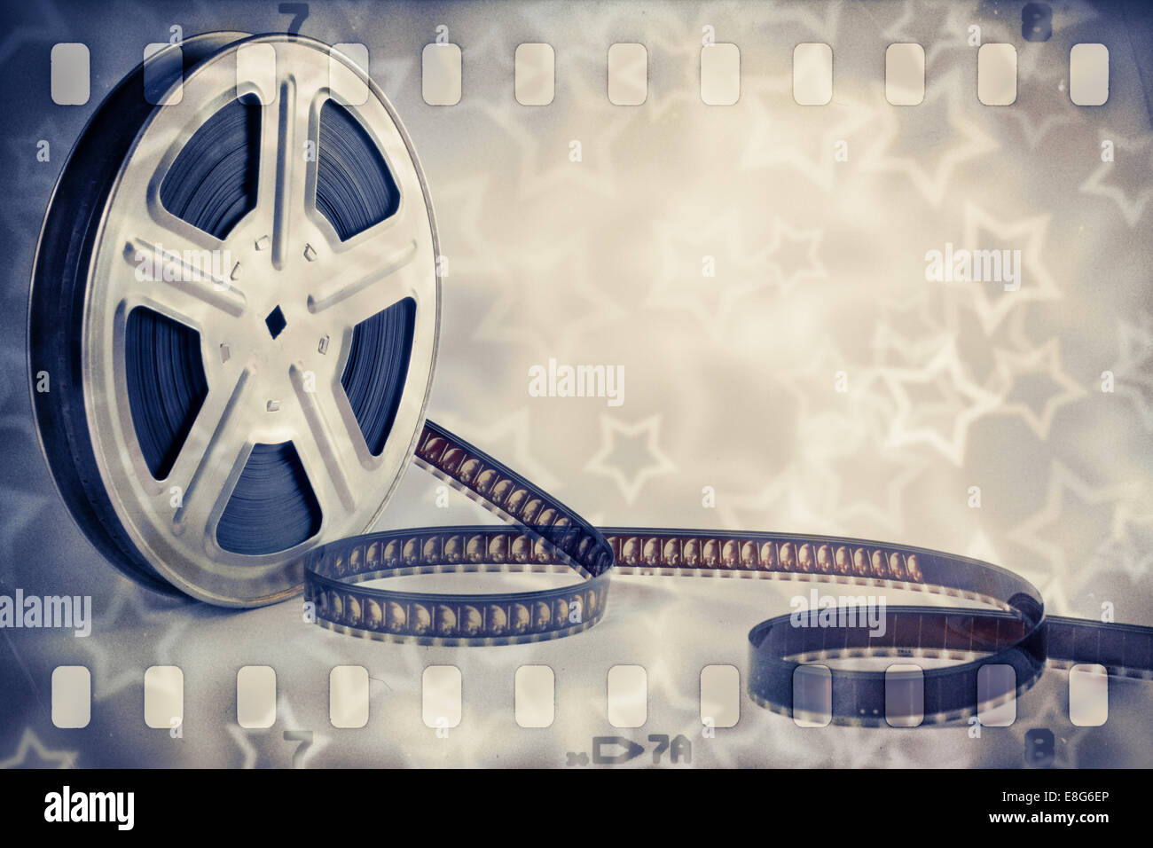 Motion Picture bobina di pellicola con striscia e stelle sfondo Foto Stock