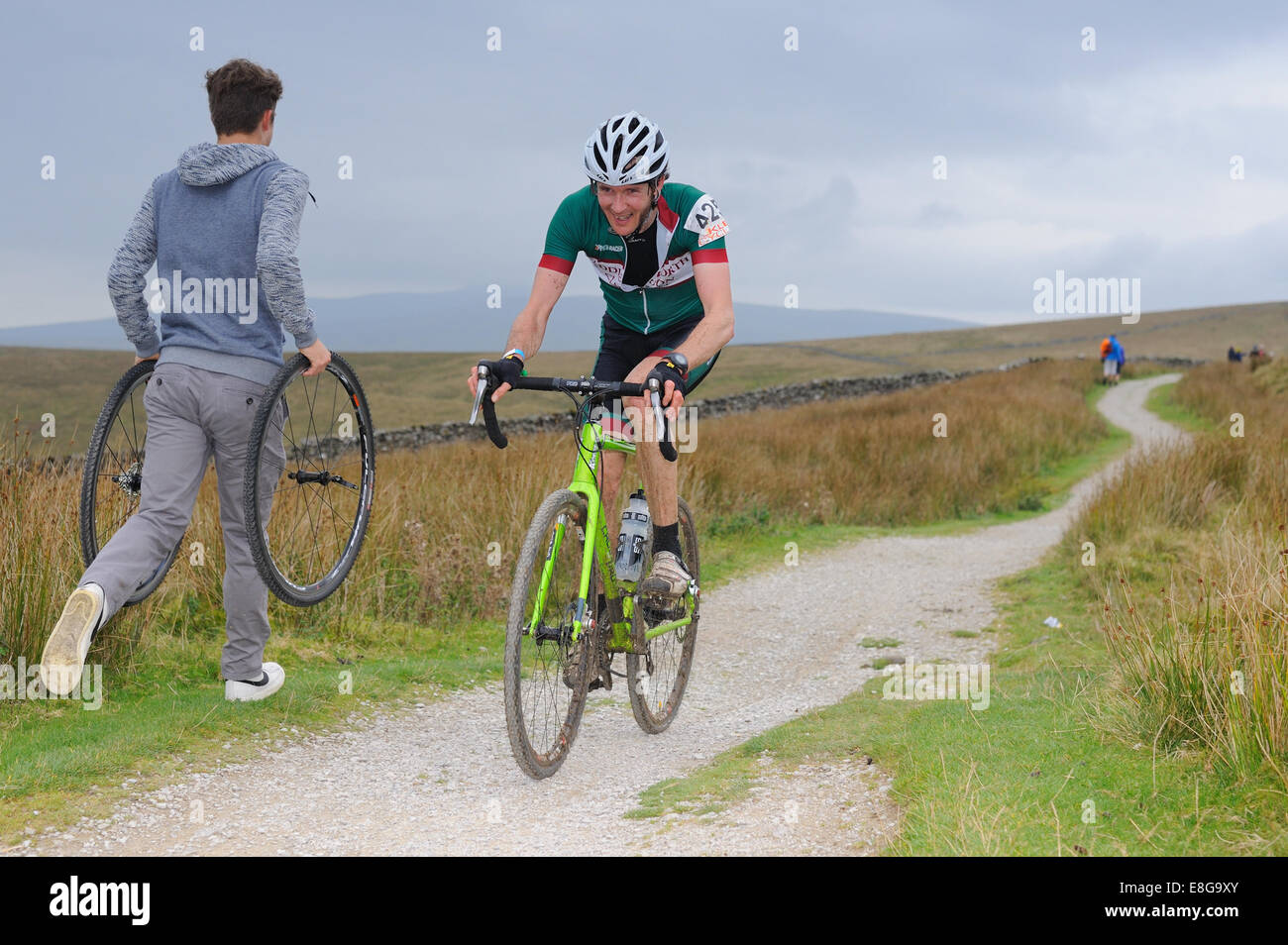 I concorrenti in tre cime gara di ciclocross Foto Stock