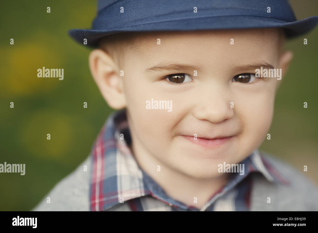 Ragazzino con hat ritratto Foto Stock