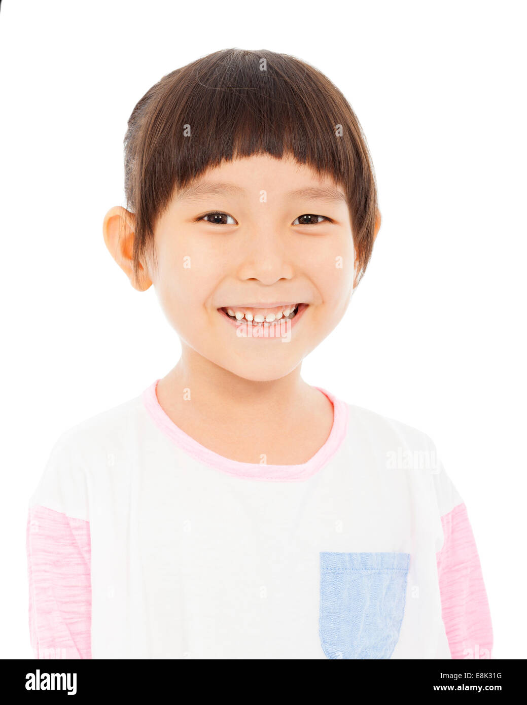 Primo piano della bambina felice espressione facciale su sfondo bianco Foto Stock