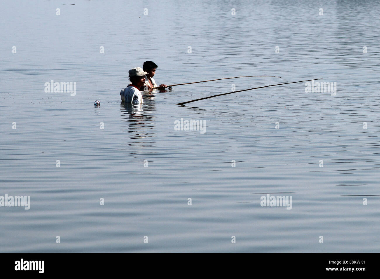 La pesca in lago Taungthaman, Amarapura, Birmania (Myanmar) Foto Stock