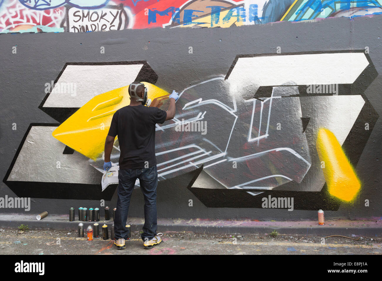 Irroratrice Graffiti a Leake Street, Londra. Autorizzati graffiti zona di spruzzatura in Londra, Regno Unito. Foto Stock