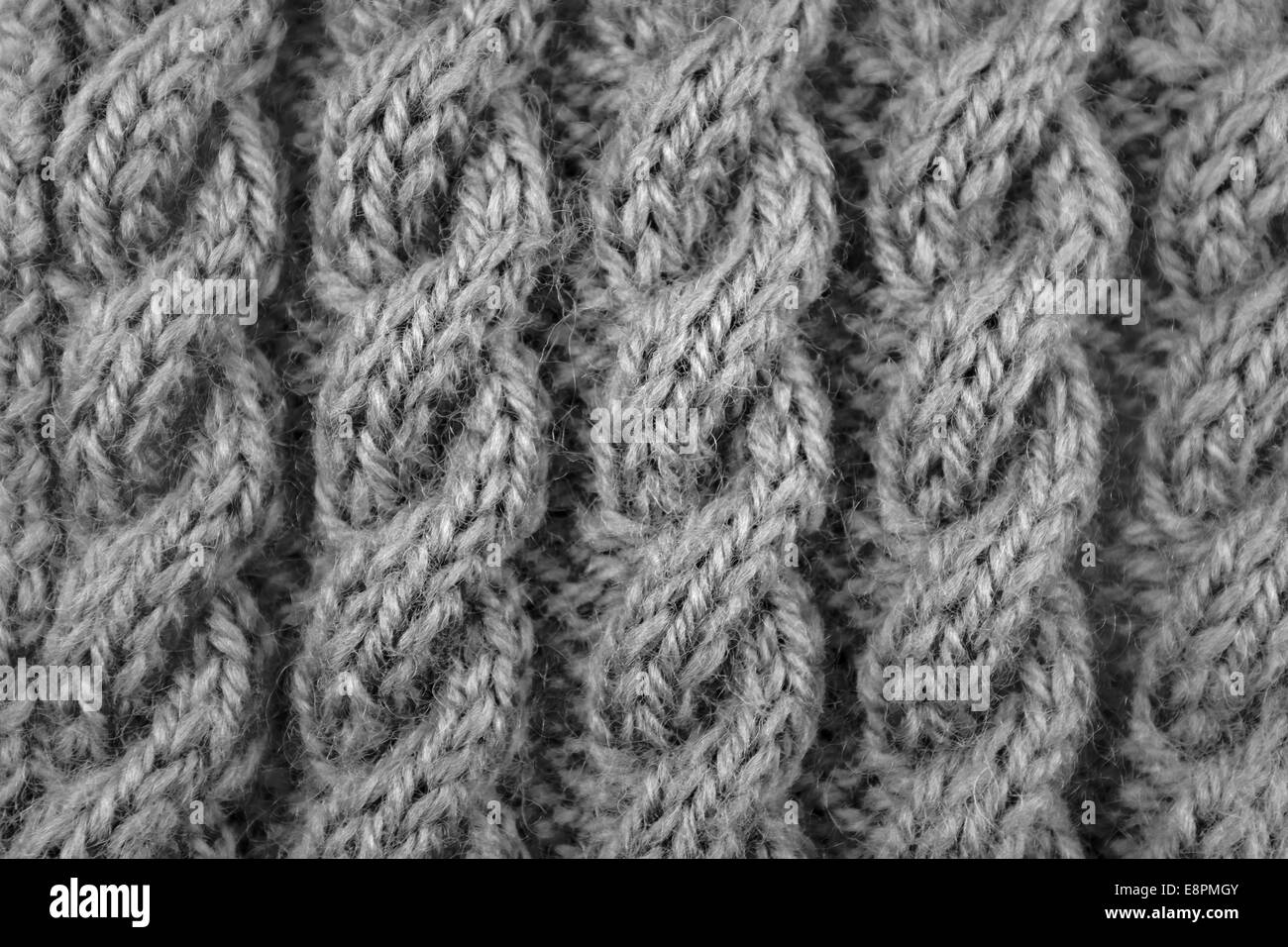 Chiudere fino a spirale cavo corda maglia stitch - elaborazione monocromatica Foto Stock