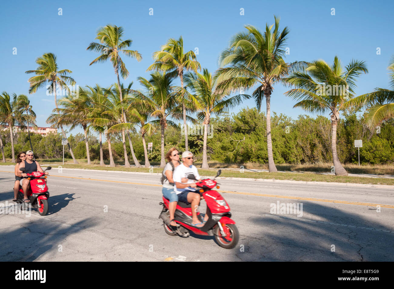 I turisti su scooter a Key West, Florida, Stati Uniti d'America Foto Stock