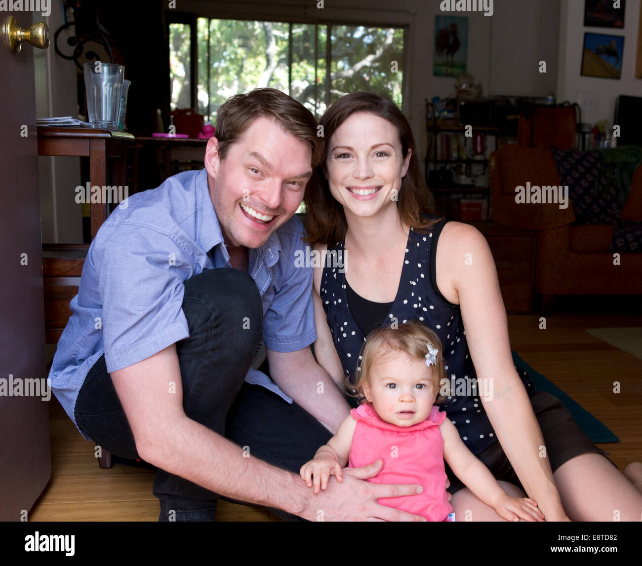 Famiglia caucasica insieme sorridente Foto Stock