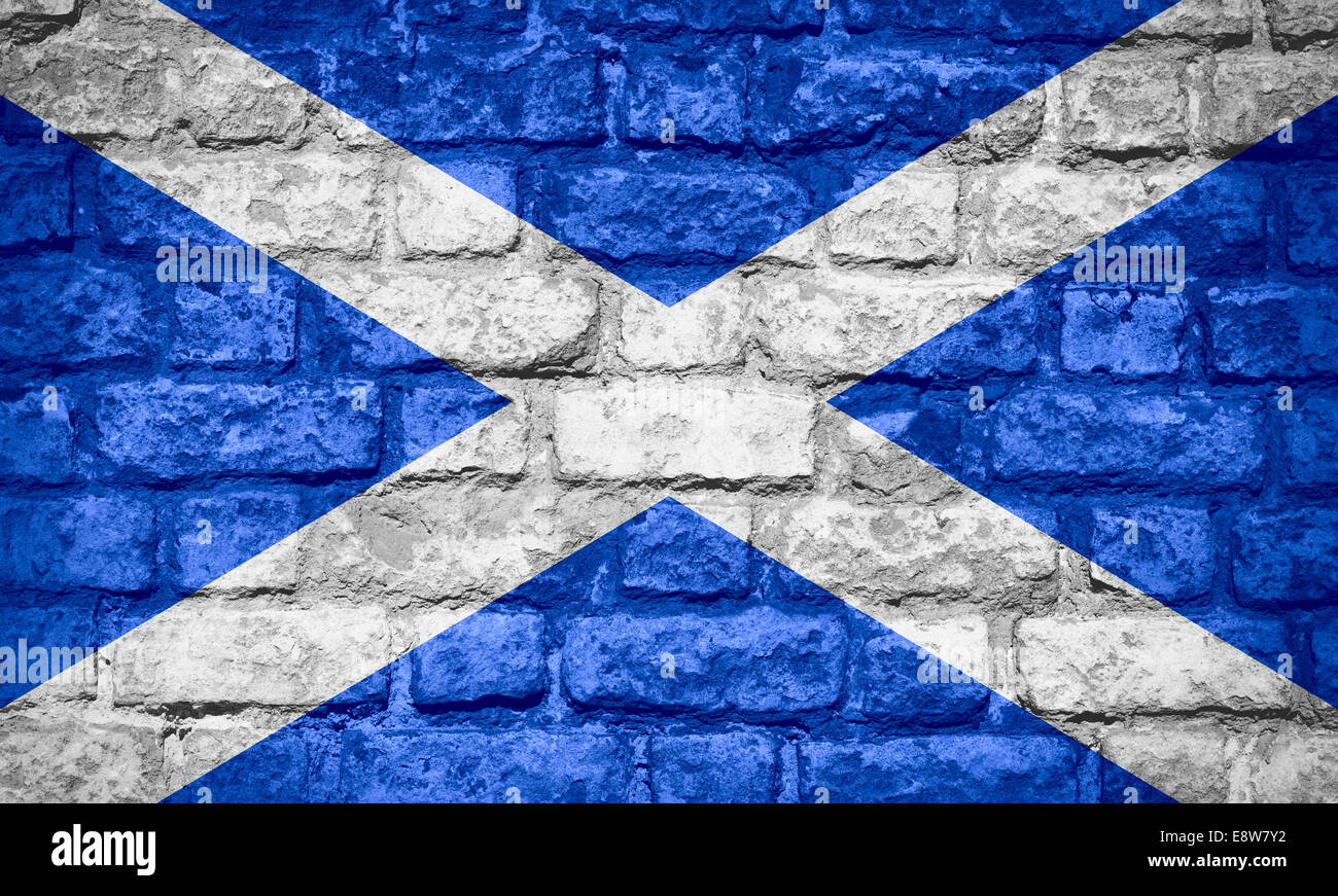 Bandiera della Scozia o banner scozzese sulla texture di mattoni Foto Stock