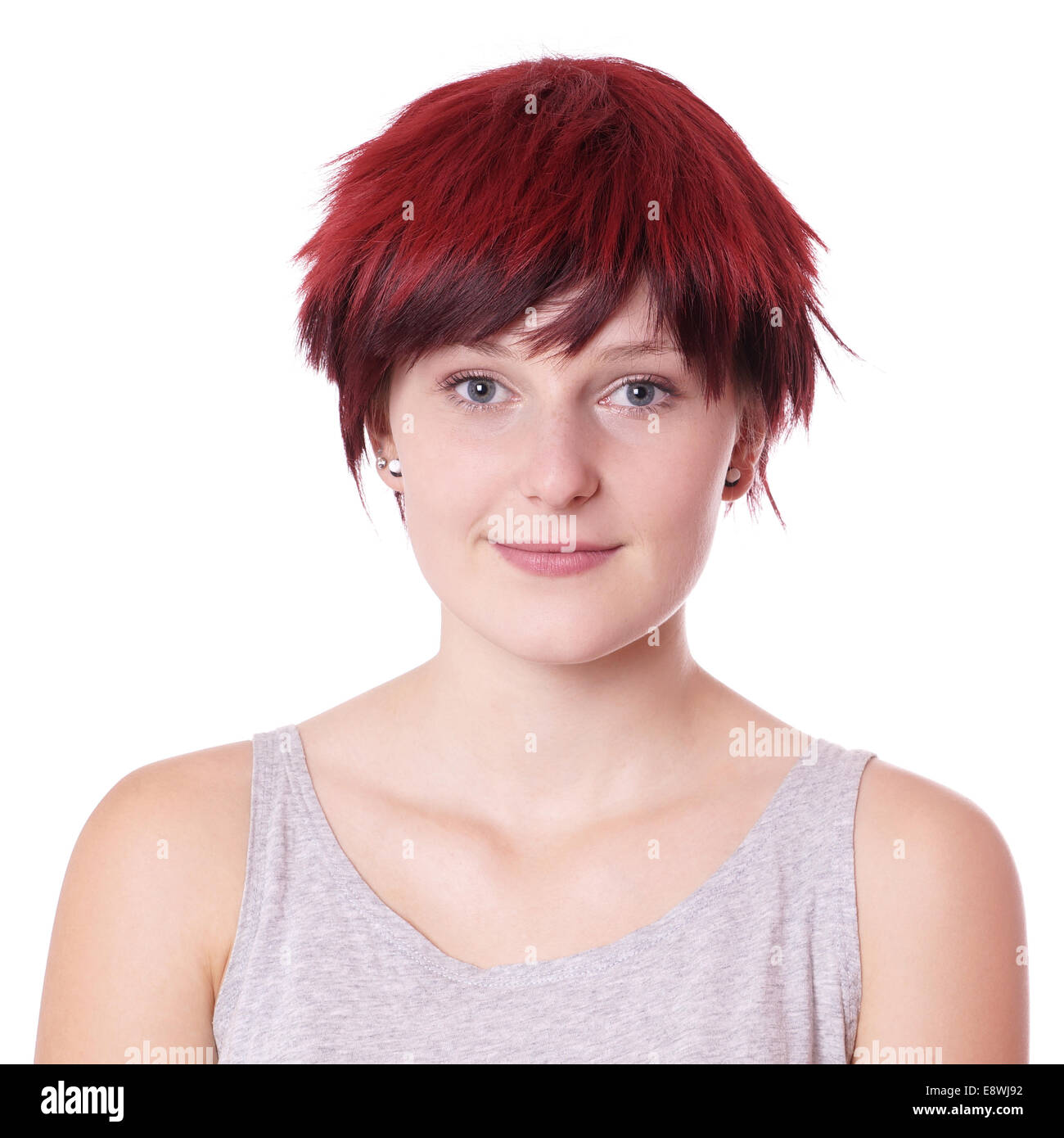 Giovane donna con fanciullesco di capelli corti Foto Stock