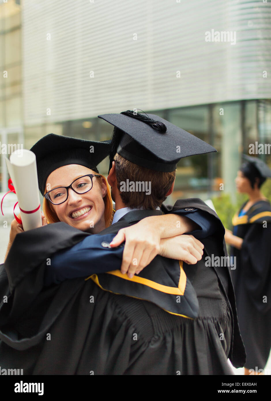 Gli studenti nel cappuccio e camice avvolgente Foto Stock