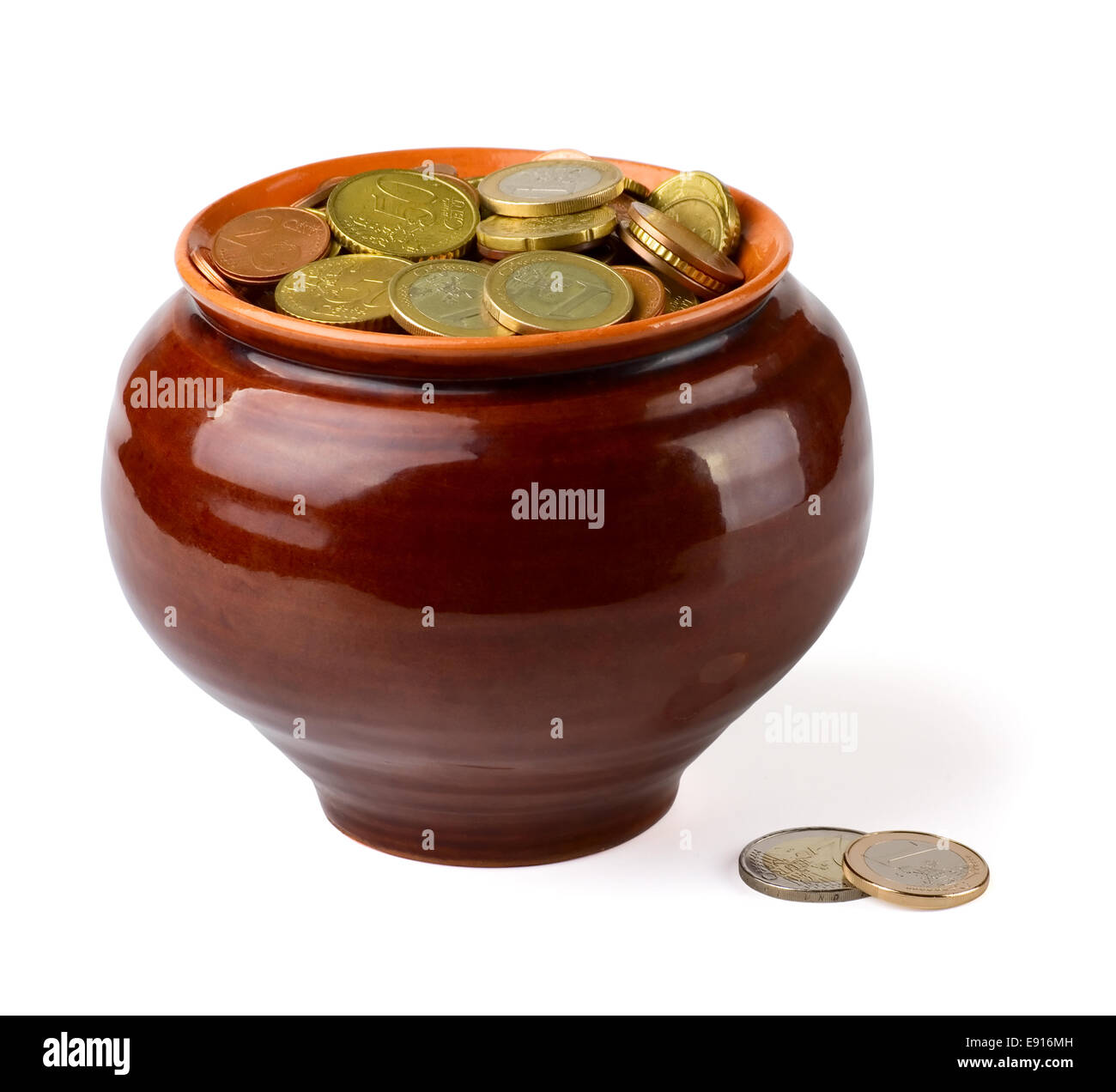 Monete in vaso Foto Stock