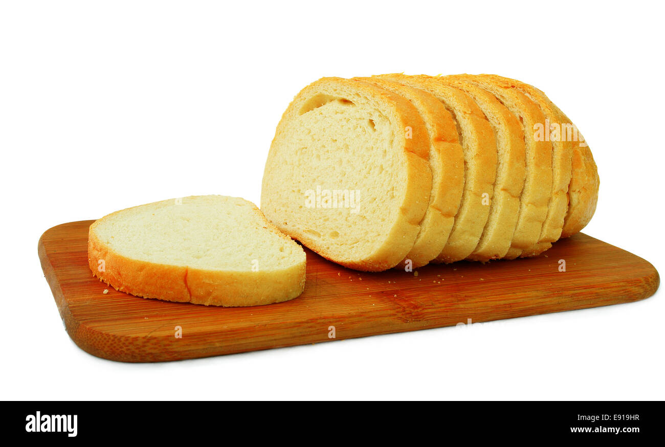 Fette di pane bianco su un legno tagliere Foto Stock