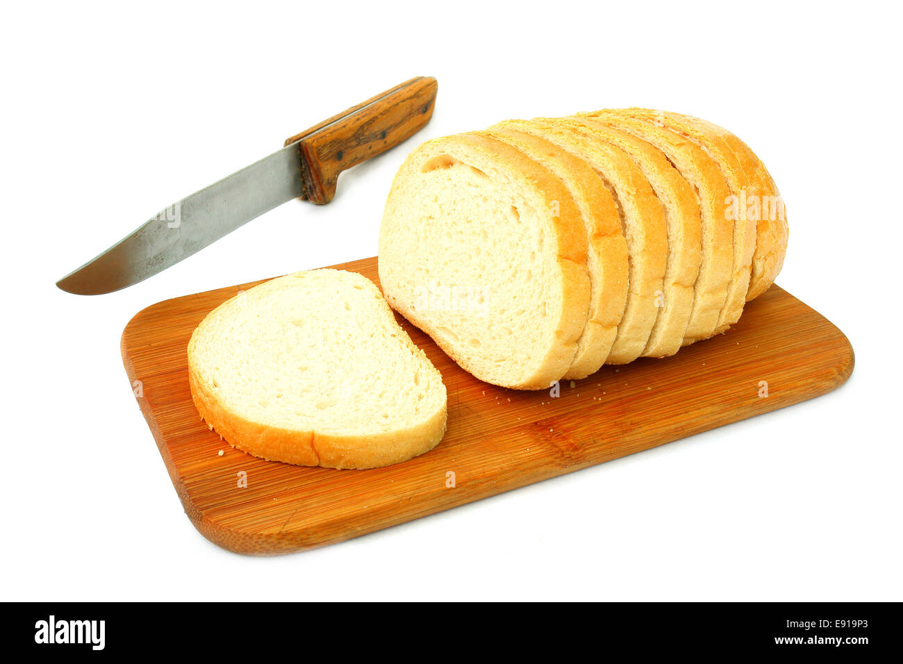 Fette di pane bianco su un legno tagliere Foto Stock