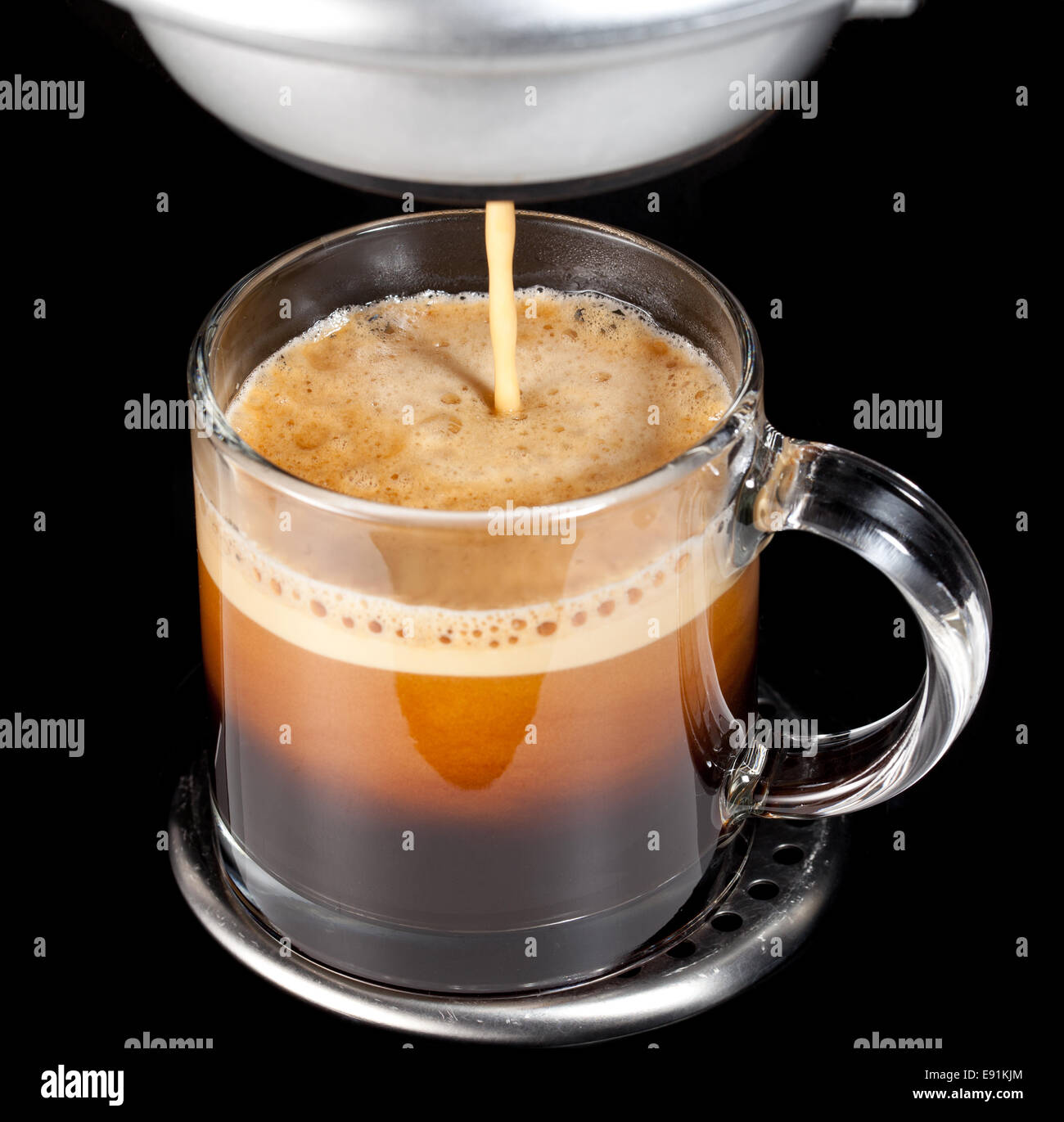 Caffè espresso in tazza di vetro Foto Stock
