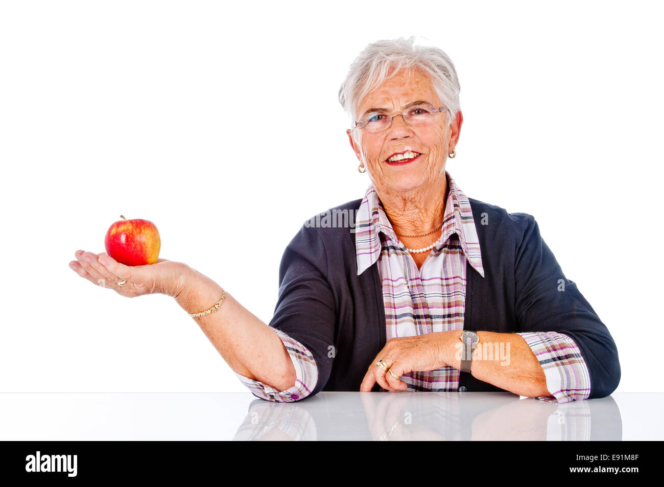 Titolare di pensione o di rendita con Apple Foto Stock