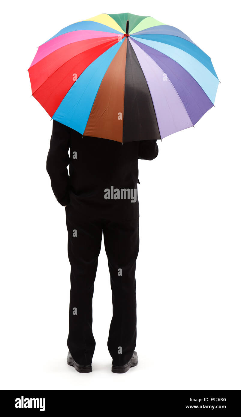 Vista posteriore di un uomo con grandi e ombrello coloratissimo Foto Stock