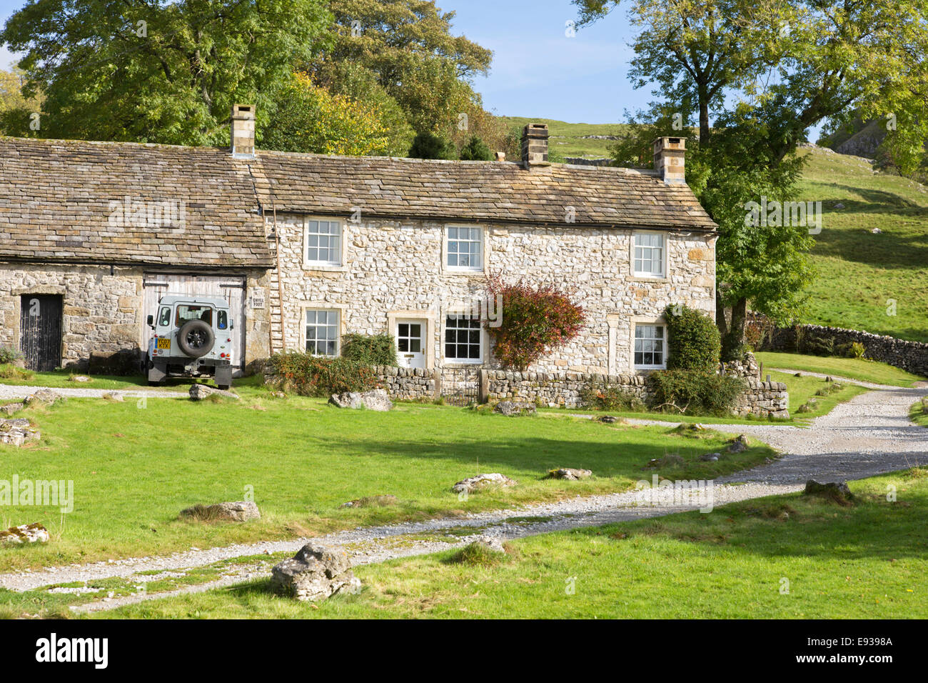 Stone farm cottages in dales villaggio di Conistone vicino Grassington, North Yorkshire, Inghilterra, Regno Unito Foto Stock