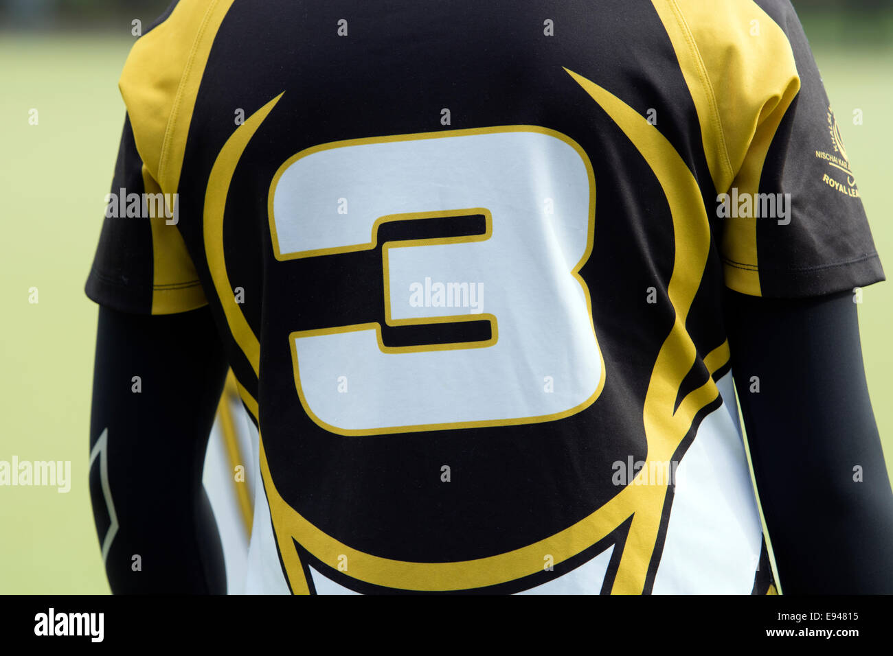 Il numero 3 su un giocatore di hockey shirt Foto Stock